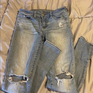 Light blue ripped jeans